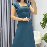 Smaragdgrünes Midikleid