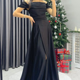 Schwarzes, trägerloses Maxi-Abendkleid aus Satin mit Steinmuster